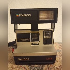 Vintage Polaroid Sun 690 LMS Instant Camera